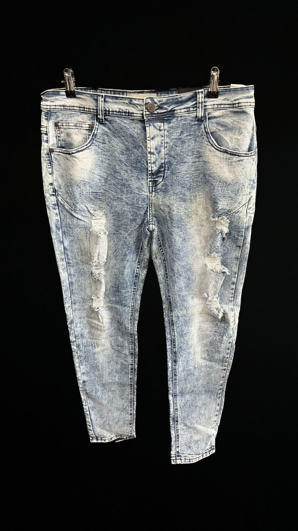 ג׳ינס כחול בהיר קרעים